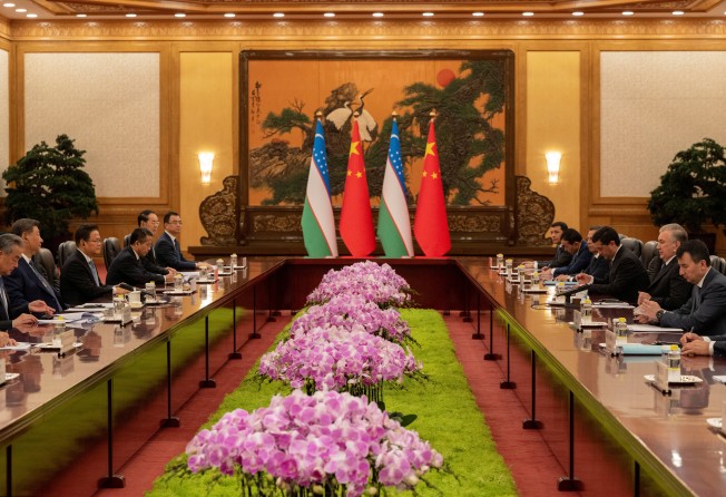 Chinese President Xi Jinping meets Uzbek President Shavkat Mirziyoyev and his delegation at the Great Hall of the People on September 2 in Beijing. Photo: Pool via Reuters