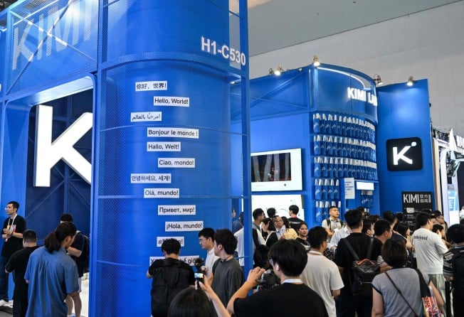 People visit the Moonshot AI stand, featuring the Kimi K3 model, during the World Artificial Intelligence Conference in Shanghai on July 18. Photo: AFP