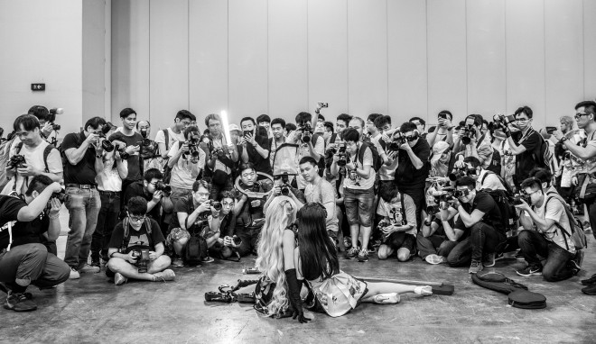 ‘Photographers’ by Yip Ka Ming is the National Geographic Wheelock Hong Kong Photo Contest 2018’s winner in the People category. Photo: Handout