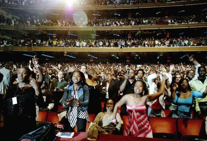 Reggae fans watch performers during the 25th Anniversary of VP Records show at Radio City Music Hall in New York City (2004).