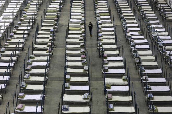 A convention center has been converted into a temporary treatment center in Wuhan.