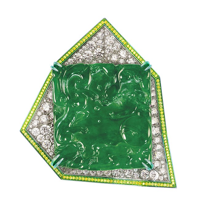 The “Sky Tower” features a 126.80-carat imperial jadeite plaque surrounded by round brilliant cut diamonds and fancy intense yellow diamonds mounted on a detachable pendant.