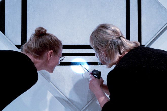 Conservators decoding Piet Mondrian’s Lozenge Composition with Eight Lines and Red (Picture No. III)