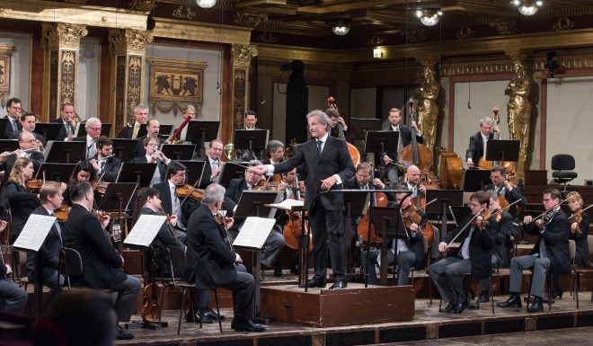 Conductor Franz Welser-Möst performs with the Vienna Philharmonic Orchestra. (Credit: Terry Linke)