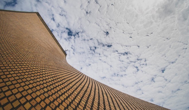 Pei designed the chapel walls with reinforced concrete to provide stability on an island frequently hit by earthquakes and typhoons. The diamond-shaped exterior tiles were made by local craftsmen.
