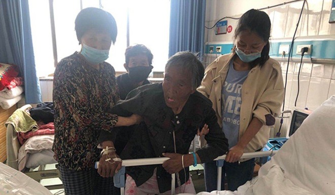 The elderly woman is recovering after being buried alive by her son. 