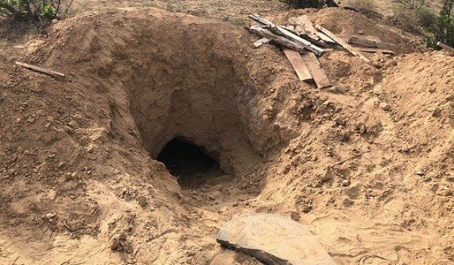 The elderly woman was rescued from this grave in Shaanxi province after surviving inside for three days. 