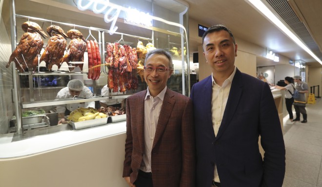 Peter Lo (left), CEO of Café de Coral, and managing director Daren Lau. Photo: Edward Wong
