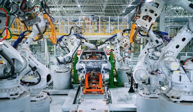 Xpeng’s new factory in the Guangdong provincial city of Zhaoqing touts 100 per cent automation for installation of car bodies at its welding workshops, with over 200 robotic arms. Photo: SCMP