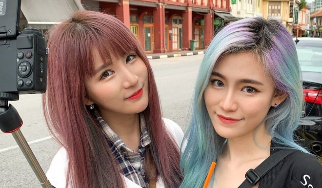 Singaporean sisters Tiffanie (left) and Michy Lim say they create videos in Mandarin to help other young people in the city state embrace the language. Photo: Tiffanie and Michy Lim
