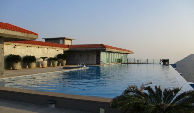The infinity pool, overlooking the sea, at the Pema Wellness centre in Andhra Pradesh, India.