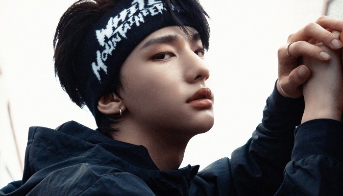 Download South Korean Rapper Hyunjin Stoic Look Wallpaper | Wallpapers.com