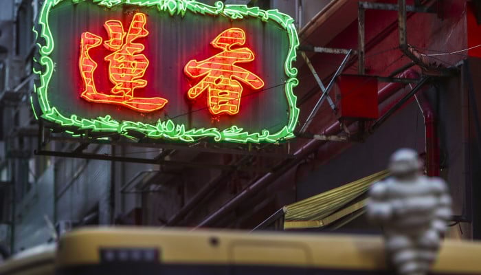 Hong Kong's iconic neon signs are slowly fading into the Hong Kong's iconic neon signs are slowly fading into the