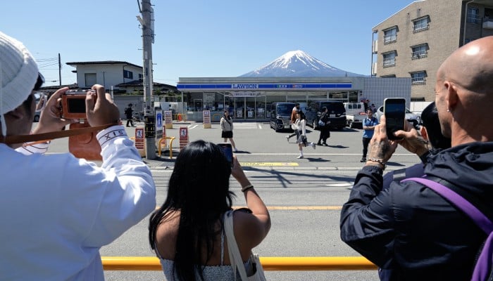 In Pictures: Japanese Town, Sick Of Tourist Crowds, Puts Up Barrier To ...