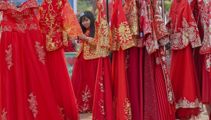 How Chinese wedding dresses are made, their symbolism and why some can cost US$13,000 | South China Morning Post How Chinese wedding dresses are made, their symbolism and why some can cost US$13,000 | South China Morning Post