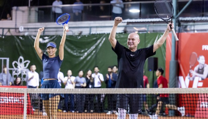 Andre Agassi and Anna Kalinskaya celebrate during a doubles match against Aryna Sabalenka and Justin Gimelstob at the Prudential NextGen Aces 2025 event in Hong Kong. Photo: courtesy NextGen Aces 2025
