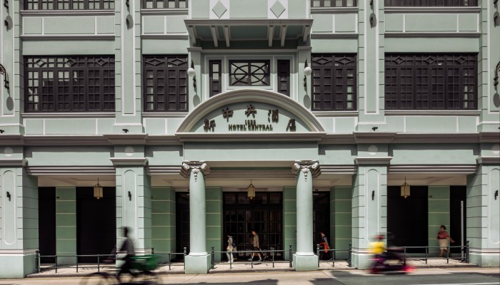 The new Hotel Central’s green facade remains faithful to the original. Photo: Eugene Chan