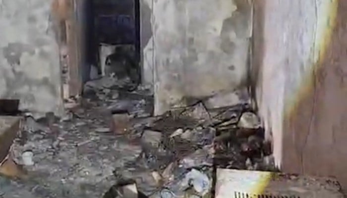 Resident returns to flat razed by Tai Po fire