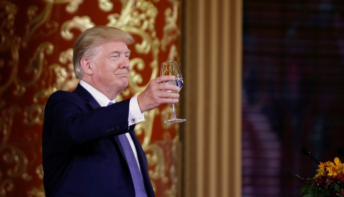 Donald Trump attends a state dinner at the Great Hall of the People, in Beijing, in 2017. Photo: Reuters
