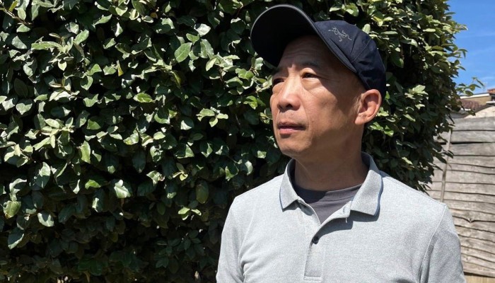 UK reviews deportation order for former Hong Kong opposition leader Wu Chi-wai amid community concerns; lawyer says officials are 'revisiting the case'.