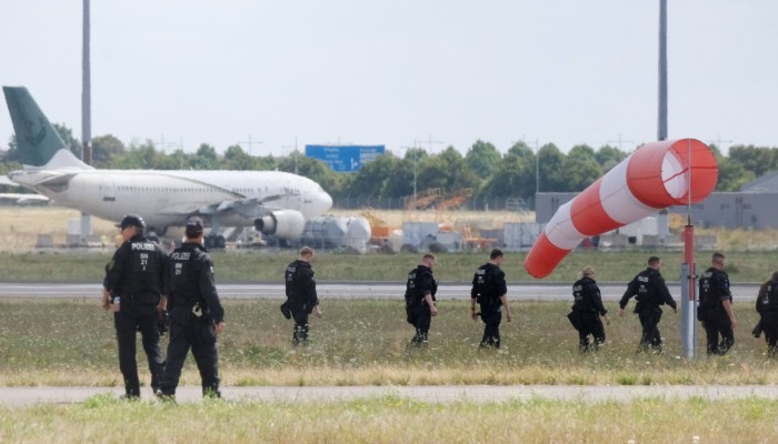Bus driver kicked explosive-laden drone out of the air at Leipzig/Halle airport, potentially preventing attack at major Nato and cargo hub