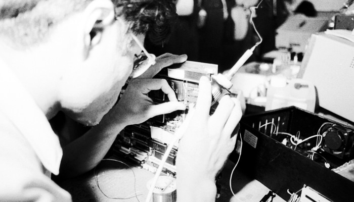 A technician works on a circuit board for electronics manufacturer International Quartz, which in the late 1980s was producing a range of computer and telephone products. Photo: SCMP Archives