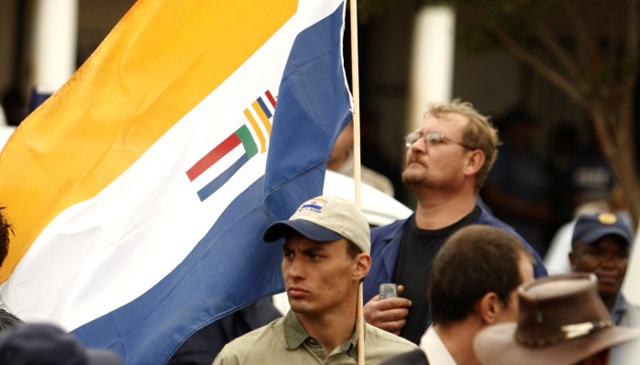 Supporters of the Afrikaner Resistance Movement (AWB) display an