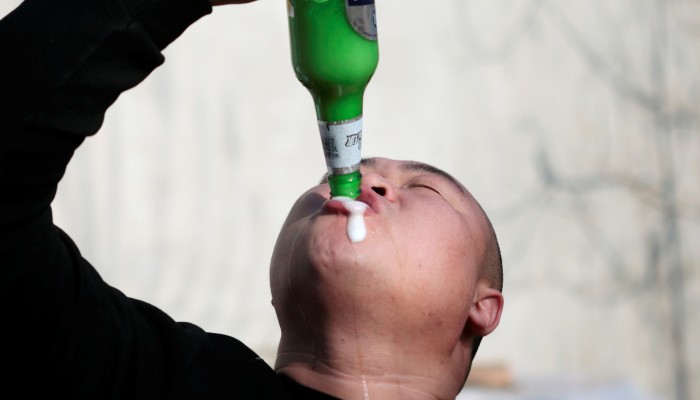 New Zealanders claim Chinese man's 'tornado beer' chug was copied from late  comedian Johnny Danger