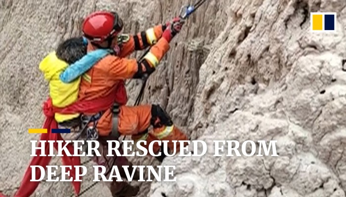 Woman hiker rescued after falling into deep ravine in western China ...