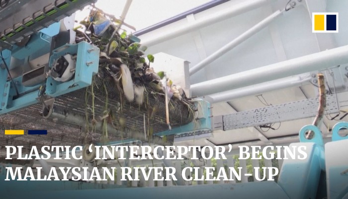 Giant plastic interceptor tackles ‘floating landfill’ on Malaysia’s ...