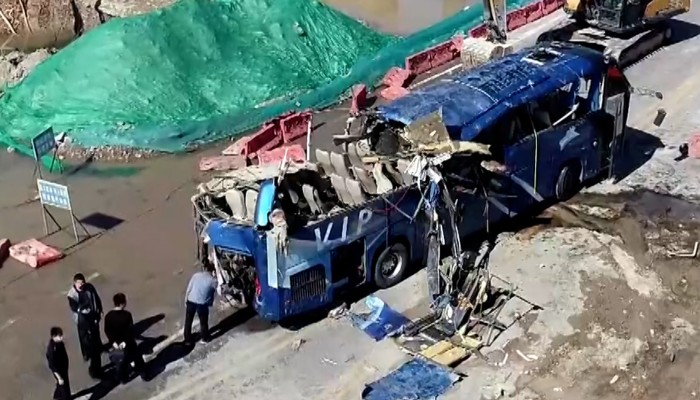 13 dead in northern China after bus runs off flooded bridge into river ...
