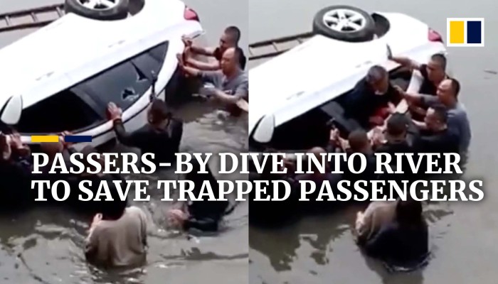 Passers-by dive into river to save passengers trapped in car | South ...