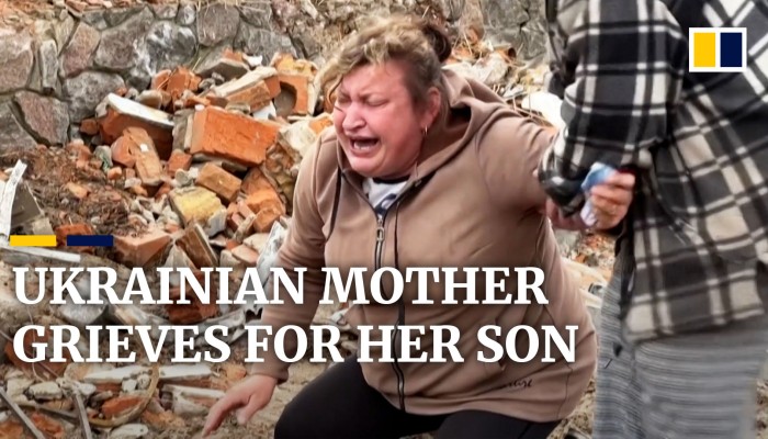 Ukrainian Mother Cries Out For Her Son After Identifying His Body