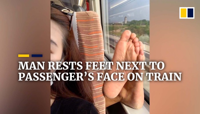Man Rests Bare Feet Next To Passenger s Face On Train In China South man-rests-bare-feet-next-to-passenger-s-face-on-train-in-china-south