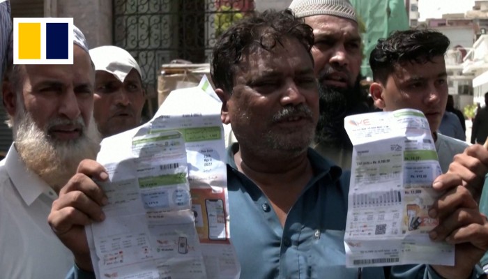 Pakistani families struggle to pay electricity bills that can take up ...