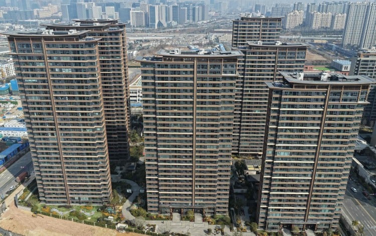 New and existing home prices across 70 major mainland cities fell at a slower pace month on month in January, according to data released by the National Bureau of Statistics. Photo: AFP
