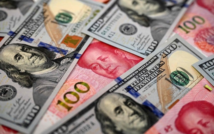 The Chinese yuan may be used more widely in cross-border payments than conventional data suggests, analysts say. Photo: AFP