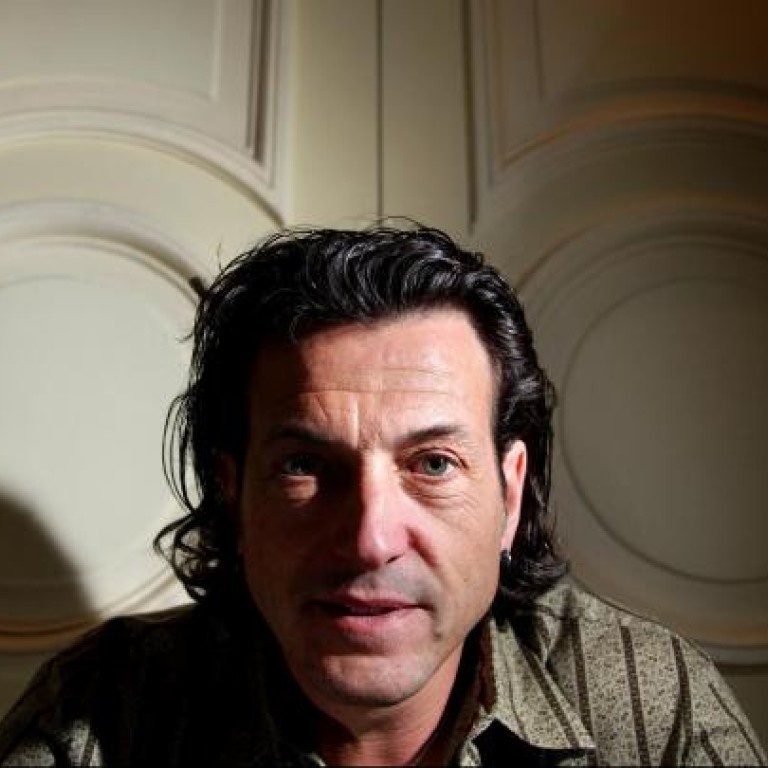 Suffused with glam-rock attitude, Stephen Webster's collection at Lane Crawford includes (below from top): couture armour-dillo ring; deep shrimp knuckleduster with black Opal; and a bondage barbs ring.