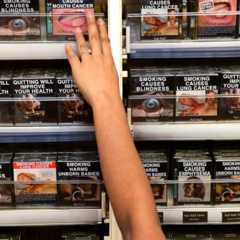 Australia rolls out world's first plain cigarette pack law South China Morning Post