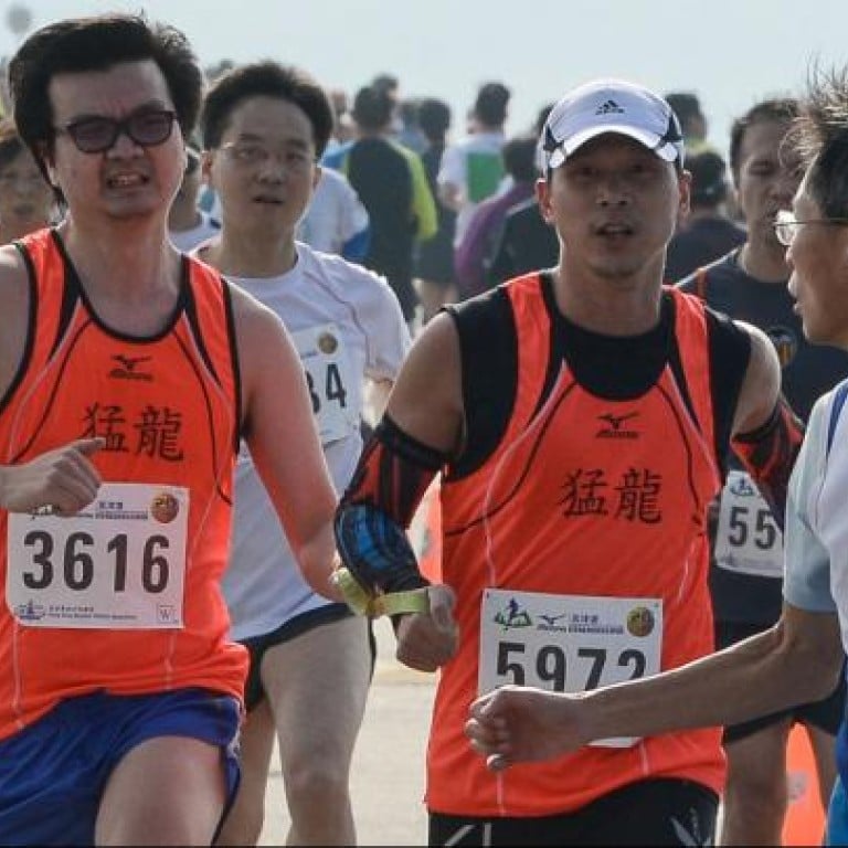 Blind runner thrilled to complete Mizuno South China Morning Post