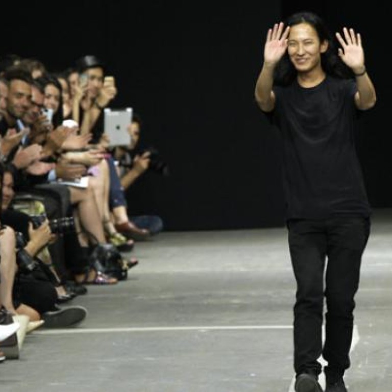 Designer Alexander Wang is taking over the creative direction of Paris fashion house Balenciaga.  Photos: AFP, AP