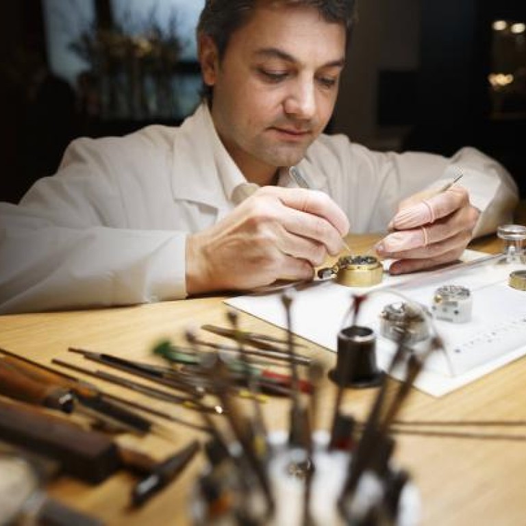A watchmaker demonstrates his expertise at the Audemars Piguet booth during the first day of the Salon International de la Haute Horlogerie watch fair in Switzerland. There has been a growing interest in women’s mechanical watches. Photo: Bloomberg
