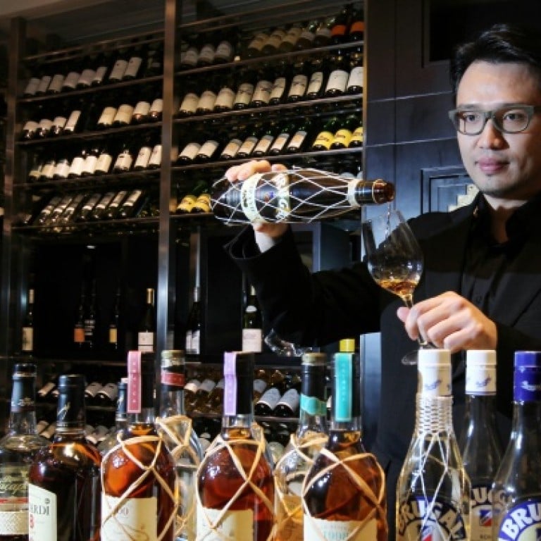 Zachary Yu, the 'Wine Guy' of Langham Place Mongkok, says a rum's complexity increases as you blend different distilling and ageing methods. Photos: K.Y.Cheng