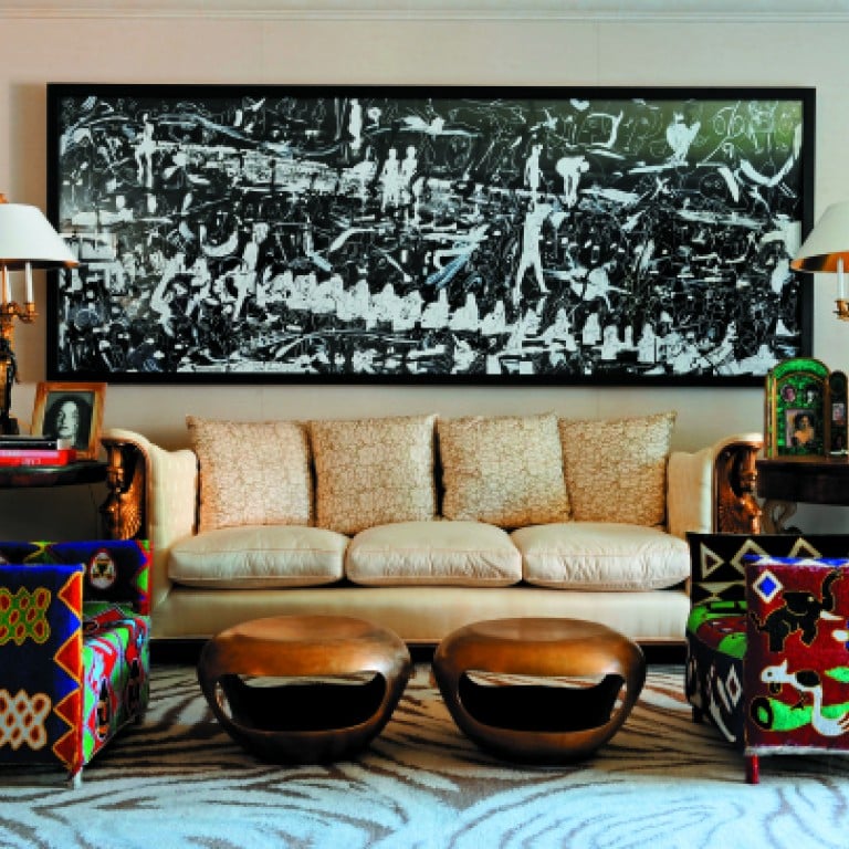 The vibrant tribal chairs stands out against the subtle silk golden eggshell-toned sofa designed by Francois Catroux. Photos: RETO GUNTLI & AGI SIMOES / LIVING INSIDE