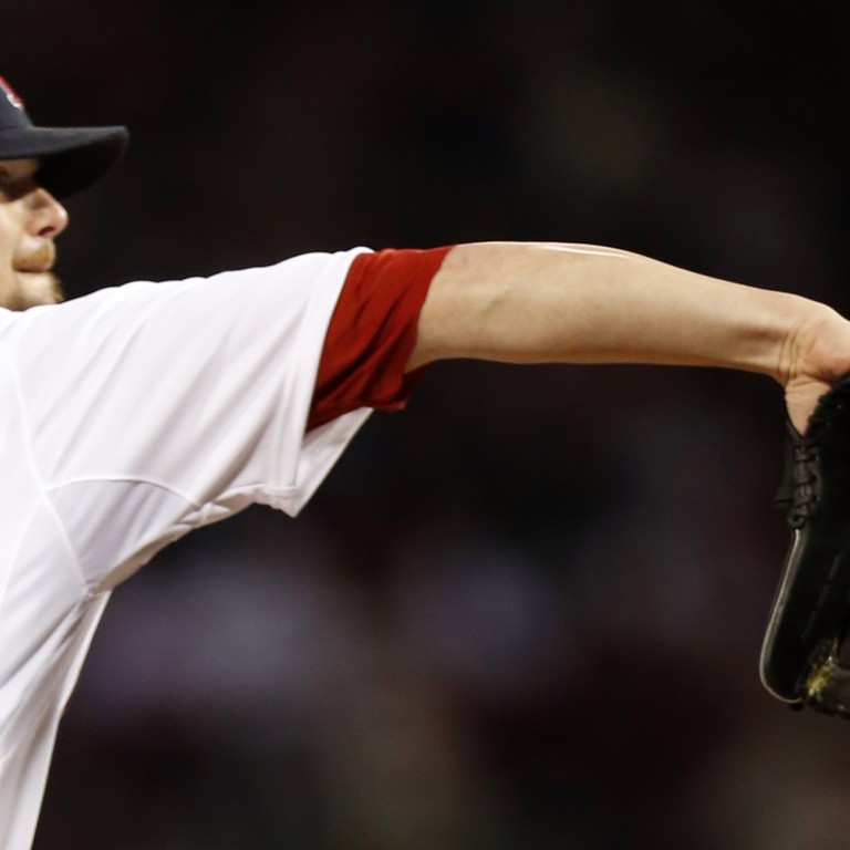 Baseball jersey worn by Boston Red Sox pitcher Jon Lester