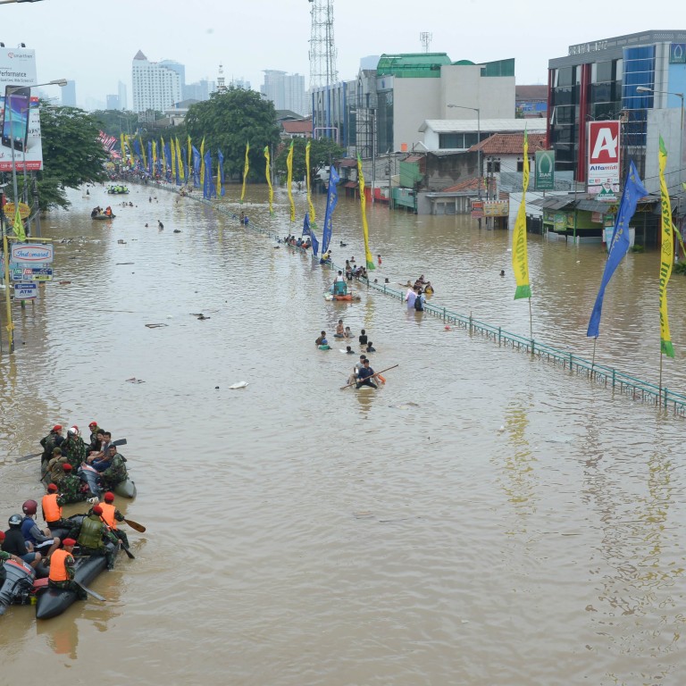 More than 10,000 Indonesians displaced by deadly floods in capital ...