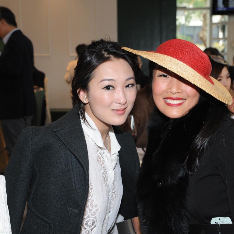 Antonia Li and Chelsea Chau, with Chau channelling hat chic at the soiree