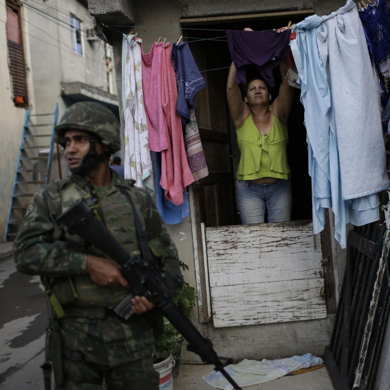 Soldiers Occupy Rio De Janeiro Slums Ahead Of Brazils World Cup Debut South China Morning Post