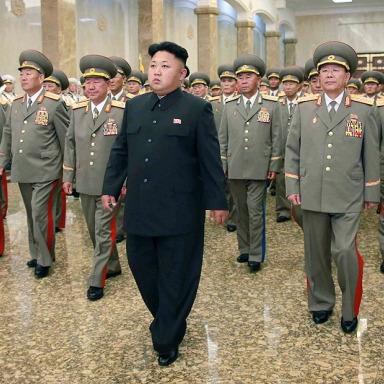 Limping North Korea leader Kim Jong-un leads memorial for his ...