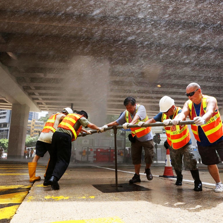 Watch Burst water pipe creates urban geyser at busy Causeway Bay